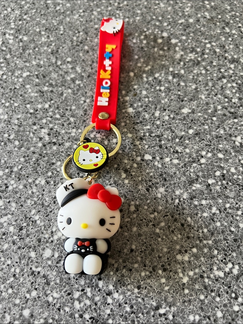 Sanrio Hello Kitty Red Silicone Strap Keychain with White Character Charm